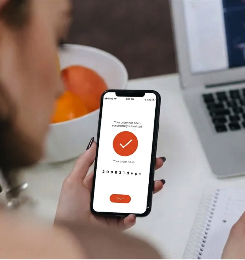 Smartphone showing a successful online order submitted confirmation with order number