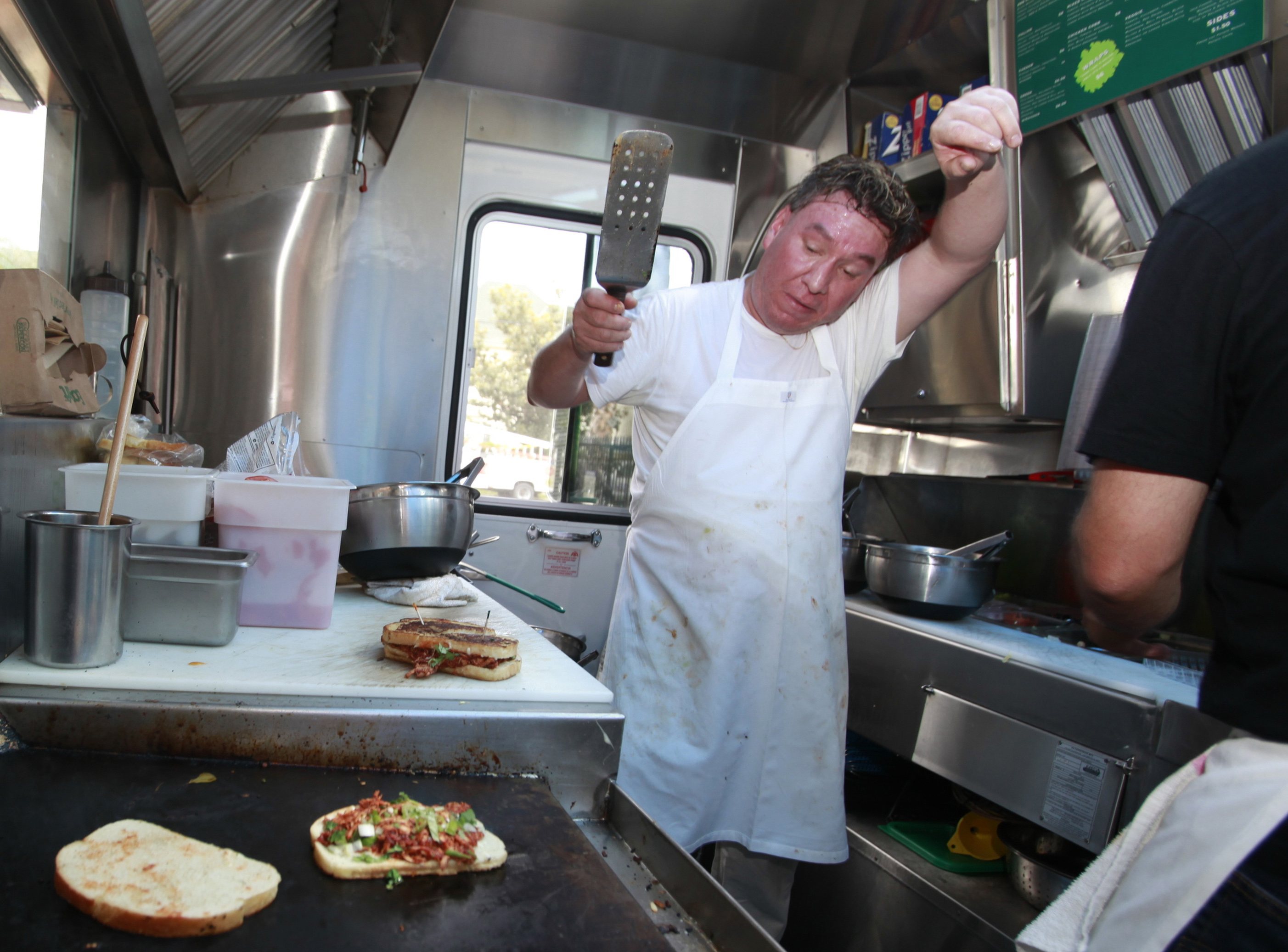 Hot summer day food truck service and outdoor heat