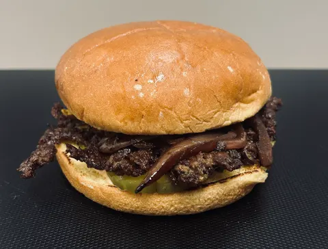 Burger item shown in the checkout mockup